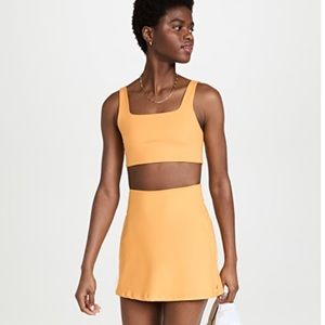 NWOT Girlfriend Collective Orange “Horizon” Sport Skort, Sz Small